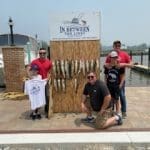 Adam, his sons Andrew and Blake making memories while on a Trophy Walleye Fishing Charter on Lake Erie aboard this 35' Viking Fishing Boat in August 2023