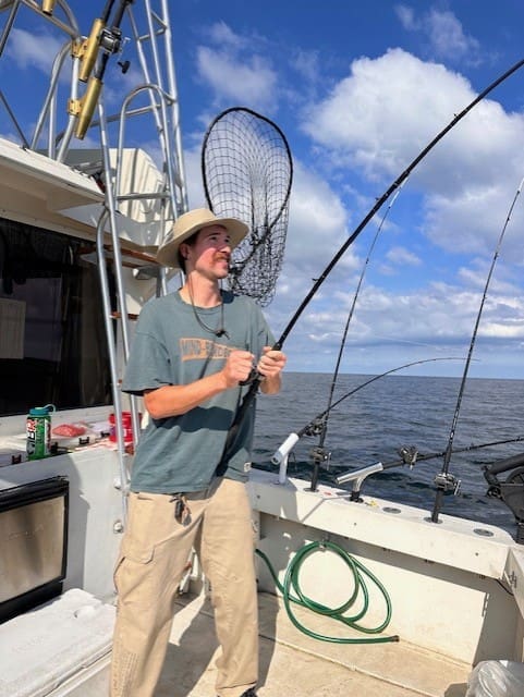 Sam showing his technique while reeling in another Trophy Walleye while Charter Fishing on Lake Erie - October 2023, aboard this 35' Viking Charter Boat