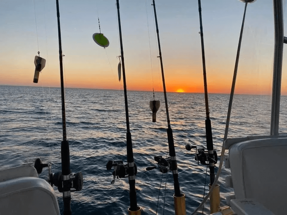 Sunset over Lake Erie after an evening trip Charter Walleye Fishing with Captain Mark on Lake Erie aboard this 35' Viking Fishing Boat.