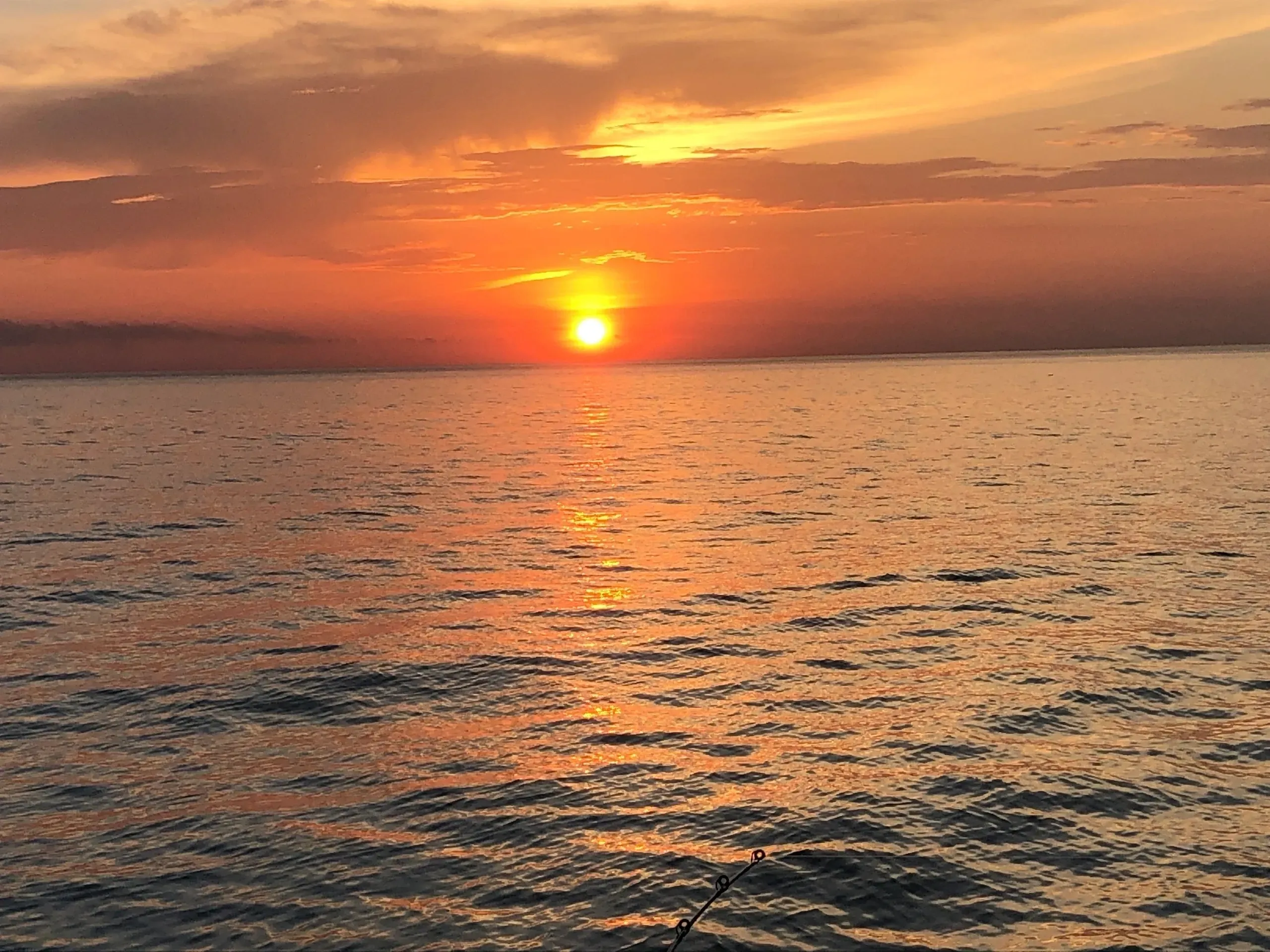 A Beautiful Sunset on Lake Erie after a Walleye Fishing Charter Fishing adventure